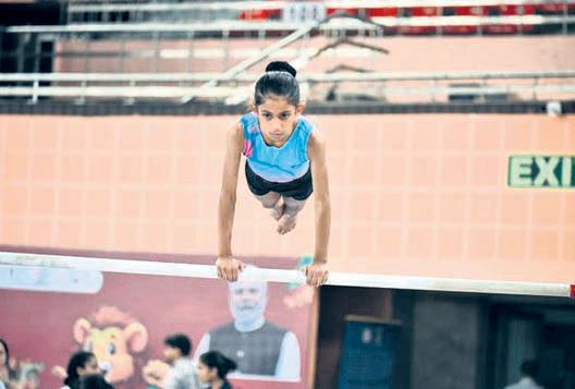 Standing upside-down from childhood brings Aavya into spotlight