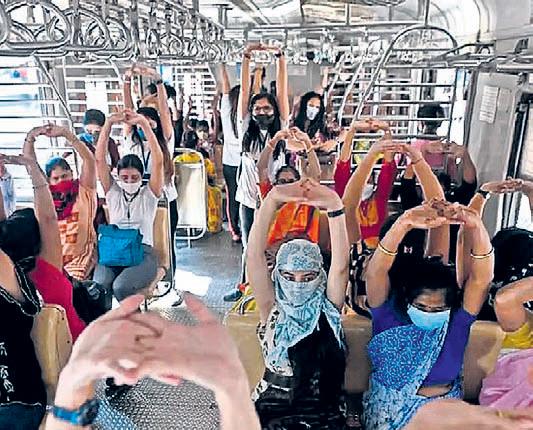 Mumbai commuters stretch, find calm in chaos