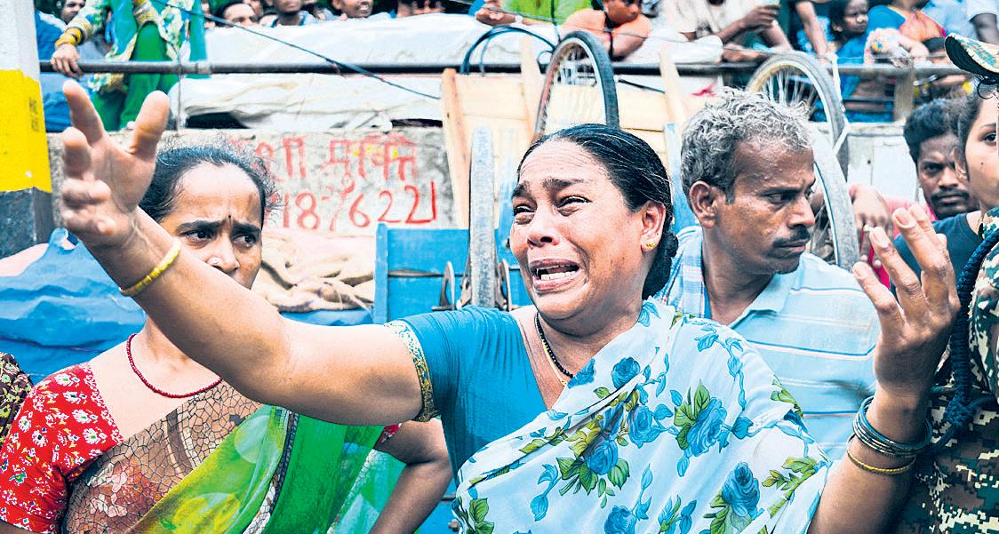 Residents watch their decades-old homes razed