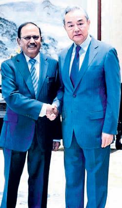 Doval meets Chinese foreign minister Wang