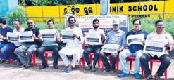 Silent protest demands closure of dump Yard
