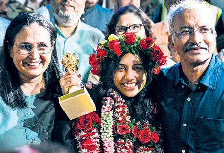 History-maker Divya gets rousing welcome