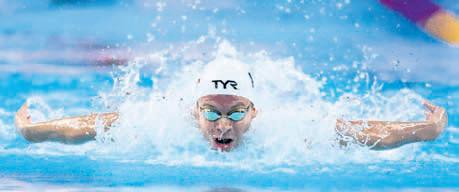 Marchand smashes 200 individual medley world record