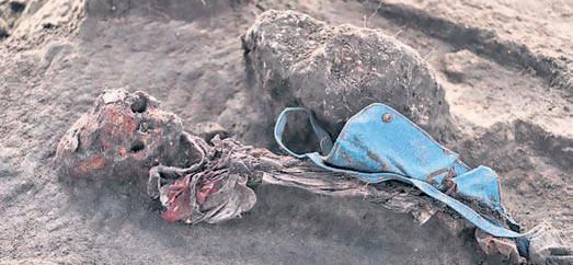 Sri Lanka wartime mass grave yields baby bottle, children's clothes
