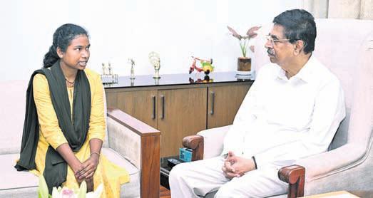 Guv honours Champa Raspeda for NEET feat