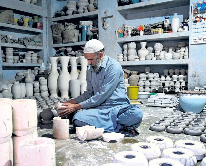 Delhi's potters craft new story of light with Al