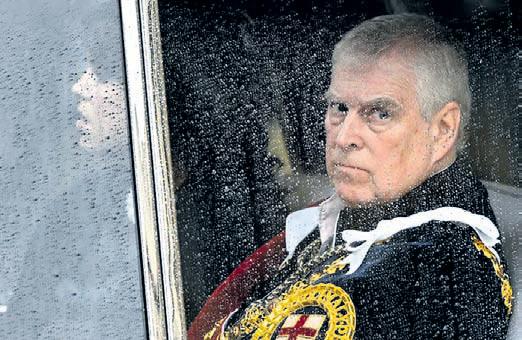 King Charles strips brother Andrew of titles, mansion