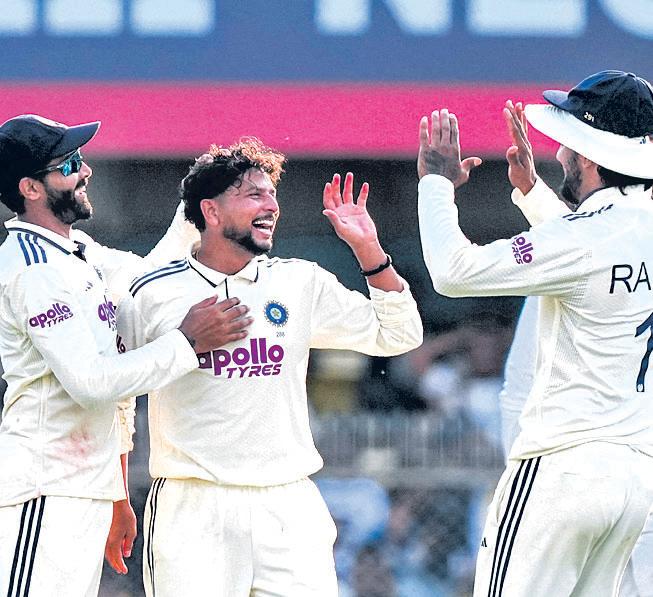 Kuldeep keeps India in fight