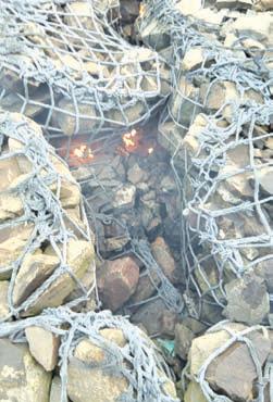 Fire damages portion of geo- synthetic sea wall