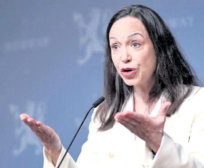 Venezuela's Machado vows to return