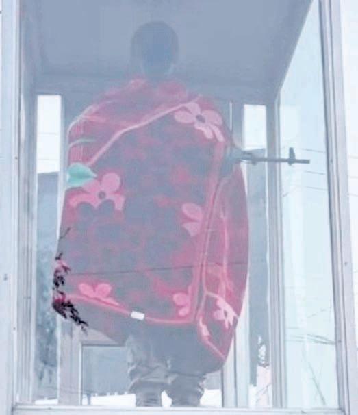 Mother’s blanket of love drapes martyred soldier’s statue