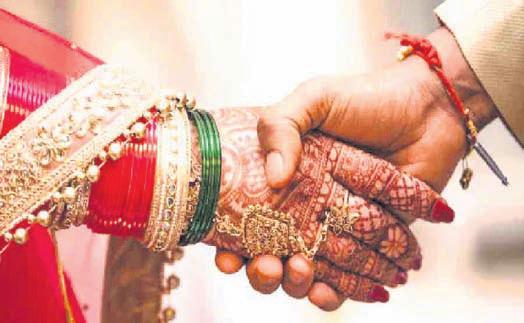 Interfaith wedding reception cancelled after protest