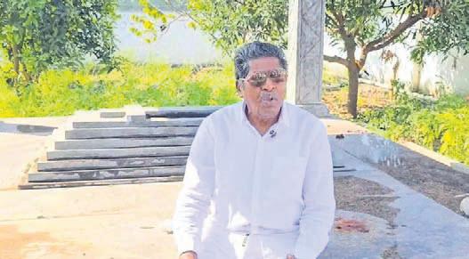 Man who built his own grave laid to rest