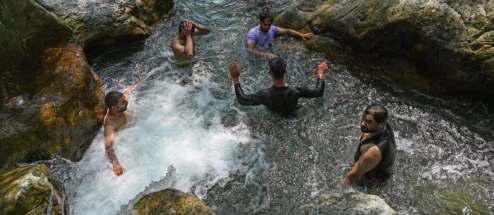 Scorching Heat Drives Kashmiris to Natural Springs