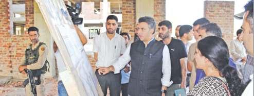 DC Budgam Reviews Progress On New District Hospital