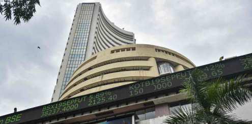 Markets End Slightly Higher Amid Global Volatility, FII Outflows