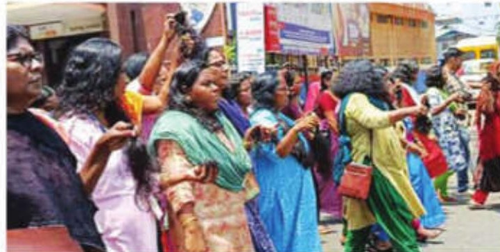 Kerala Asha workers cut hair as pay hike protest enters 50th day