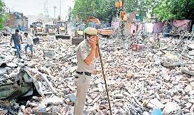 बारापुला नाले की सफाई में बाधा बने मद्रासी कैंप पर चला बुलडोजर