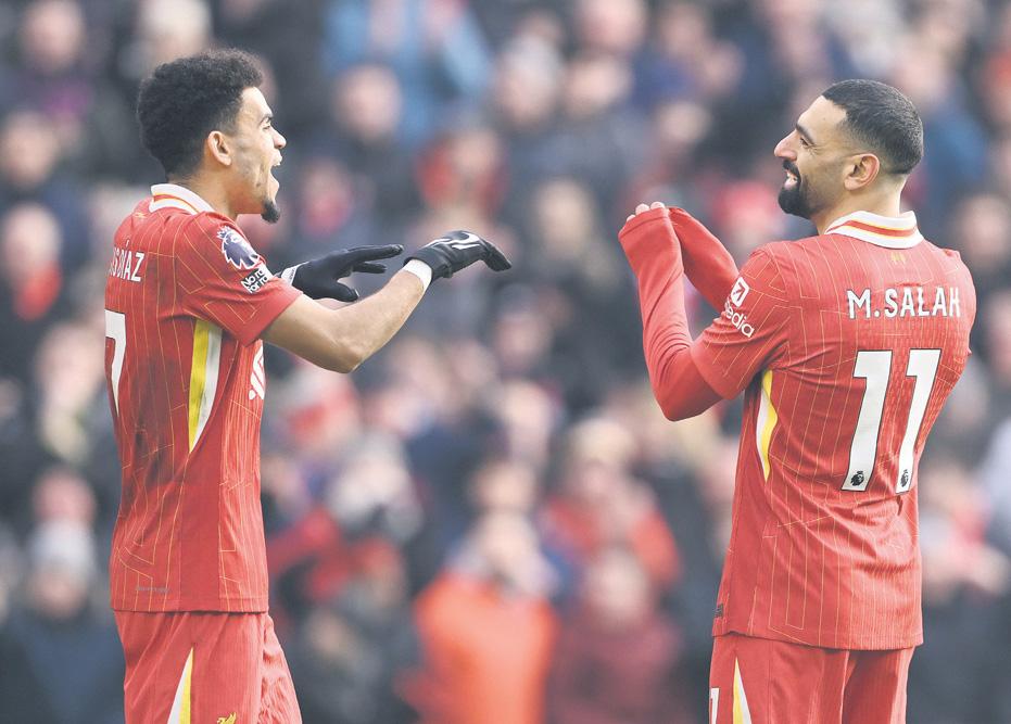 Reds tighten their grip