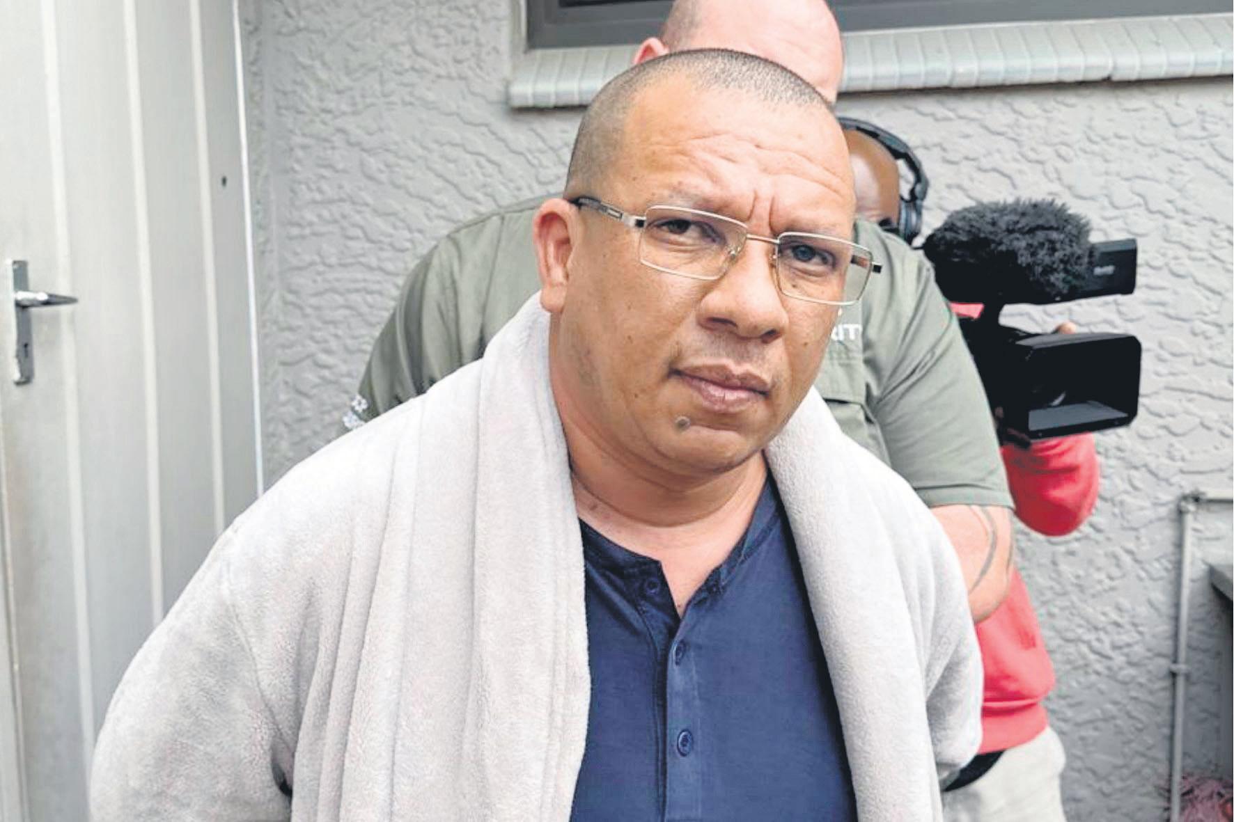 Fraud suspect hides in laundry