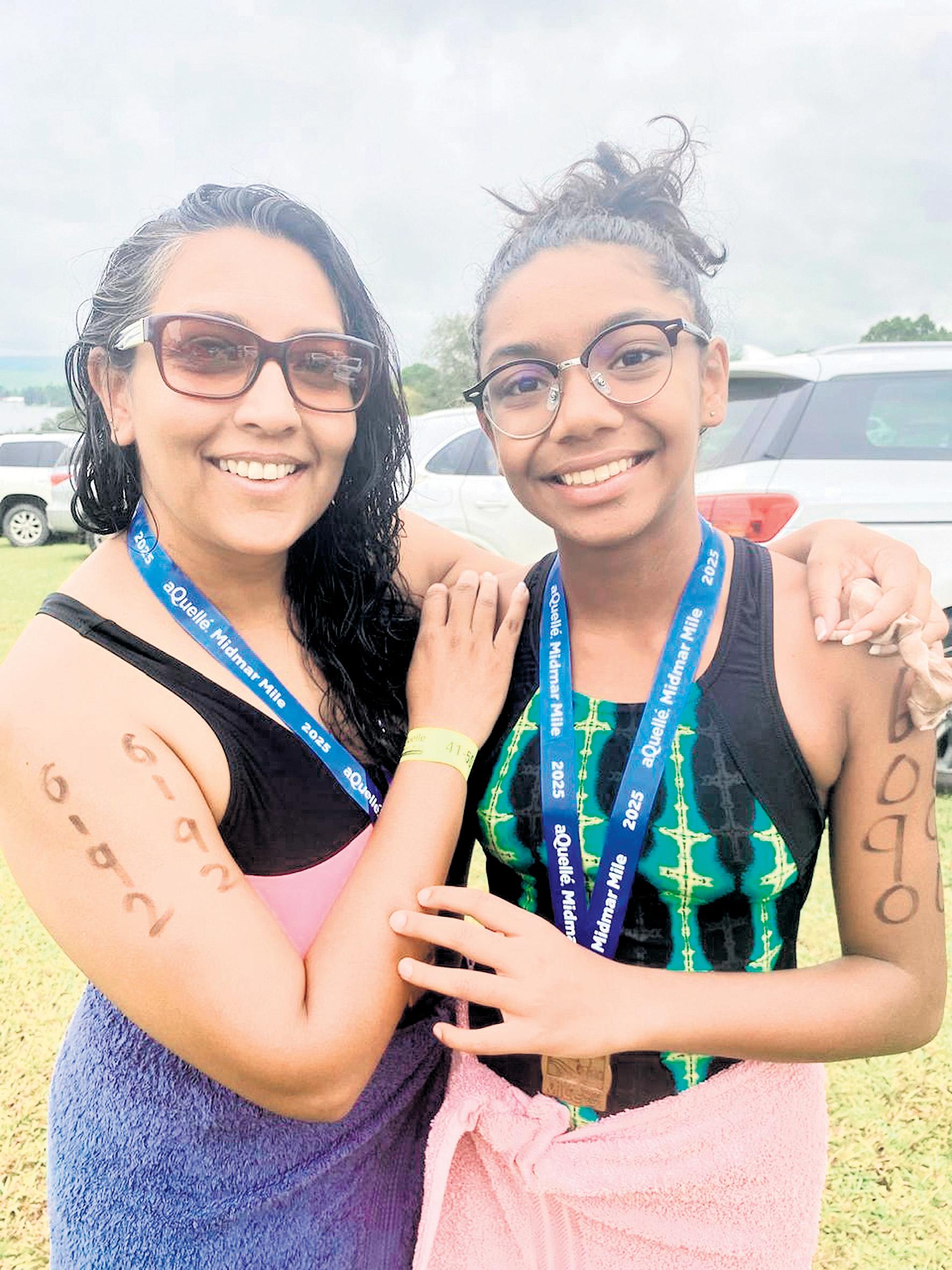 Mom, daughter swim for Midmar milestones