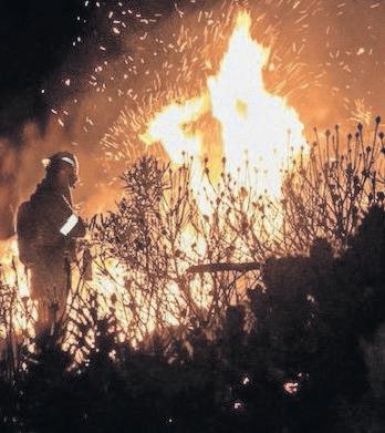 Crews still battling Chapman’s Peak blaze