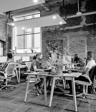 Shared workspaces have many pros for a new era, say experts