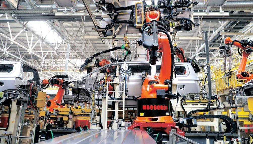 Manufacturing sentiment improves as business conditions steady in July