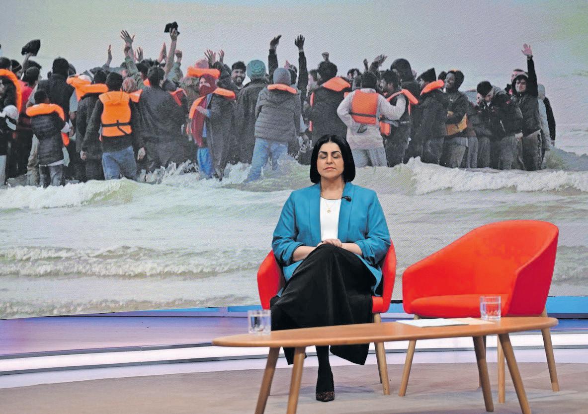 UK government defends plan to limit refugee status