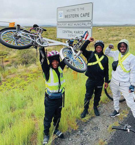 Pedalling for purpose: three Limpopo cyclists inspire youth across South Africa