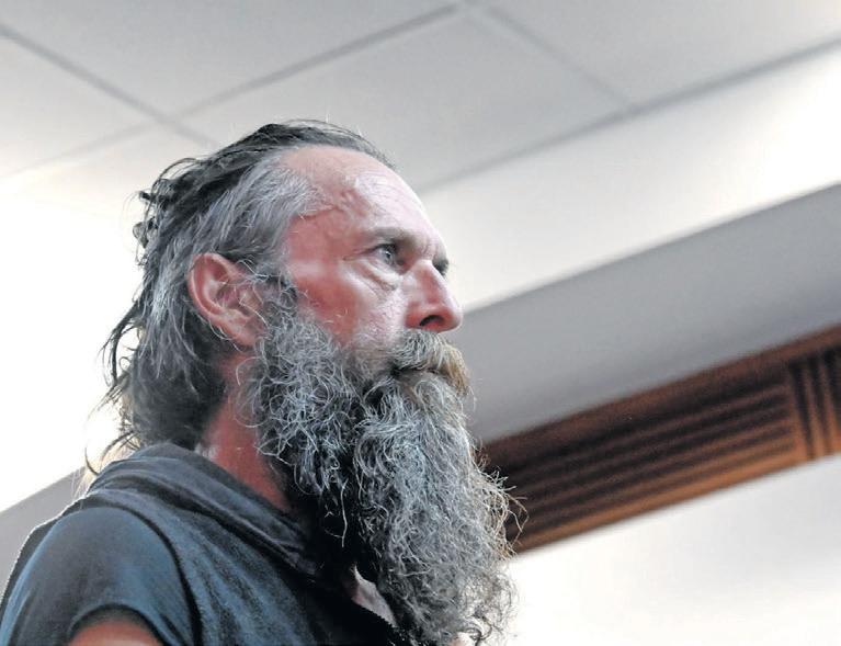 Artist in dock for ex-detective’s killing