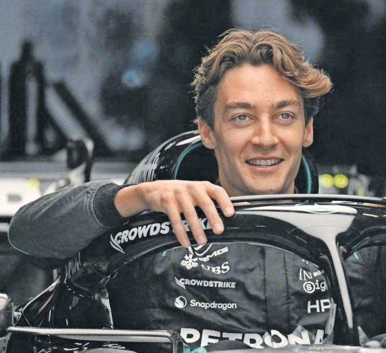 Russell downplays early title talk