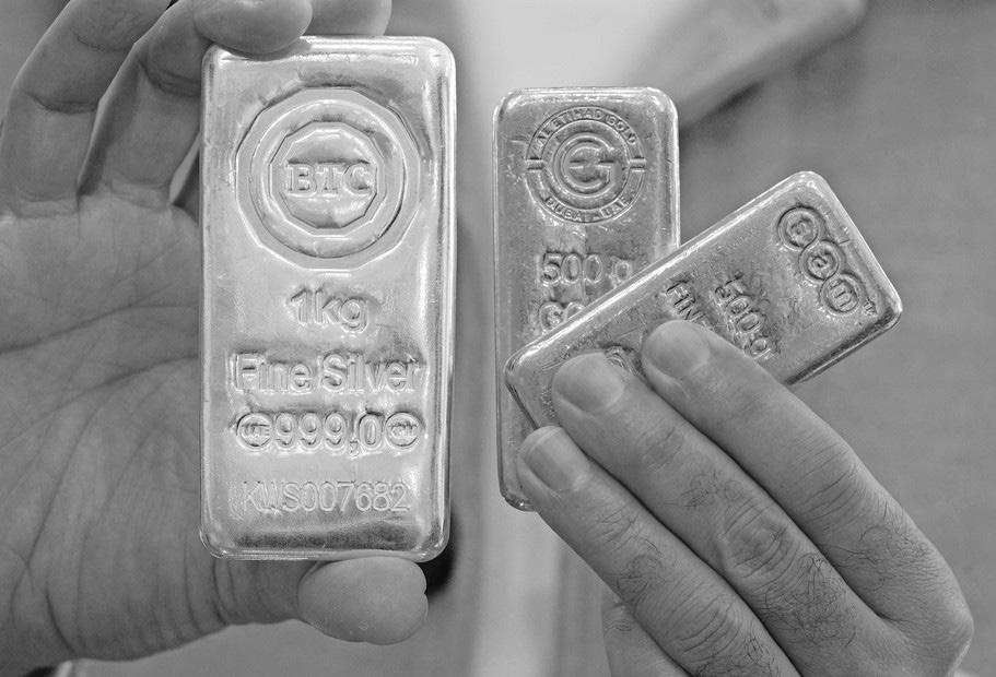 Equities sink, gold and silver hit highs