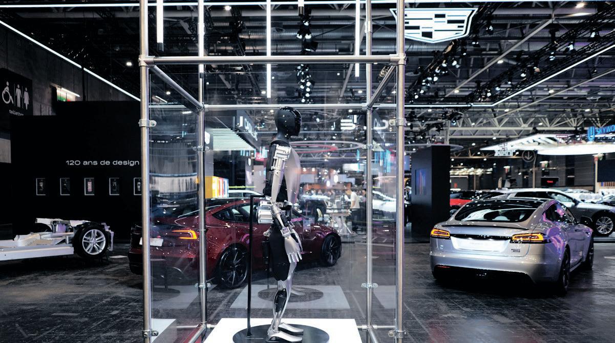 Tesla pivots to robots as investors question sales and soaring valuation