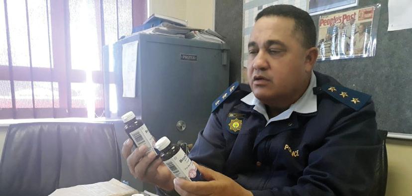 TOP COP HANGS UP LAPELS