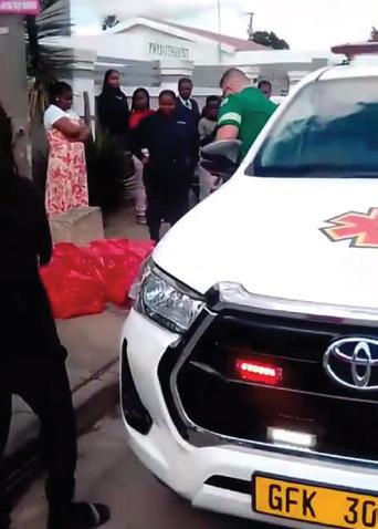 OFFICERS PROBING DISCOVERY OF TWO DECEASED INFANTS