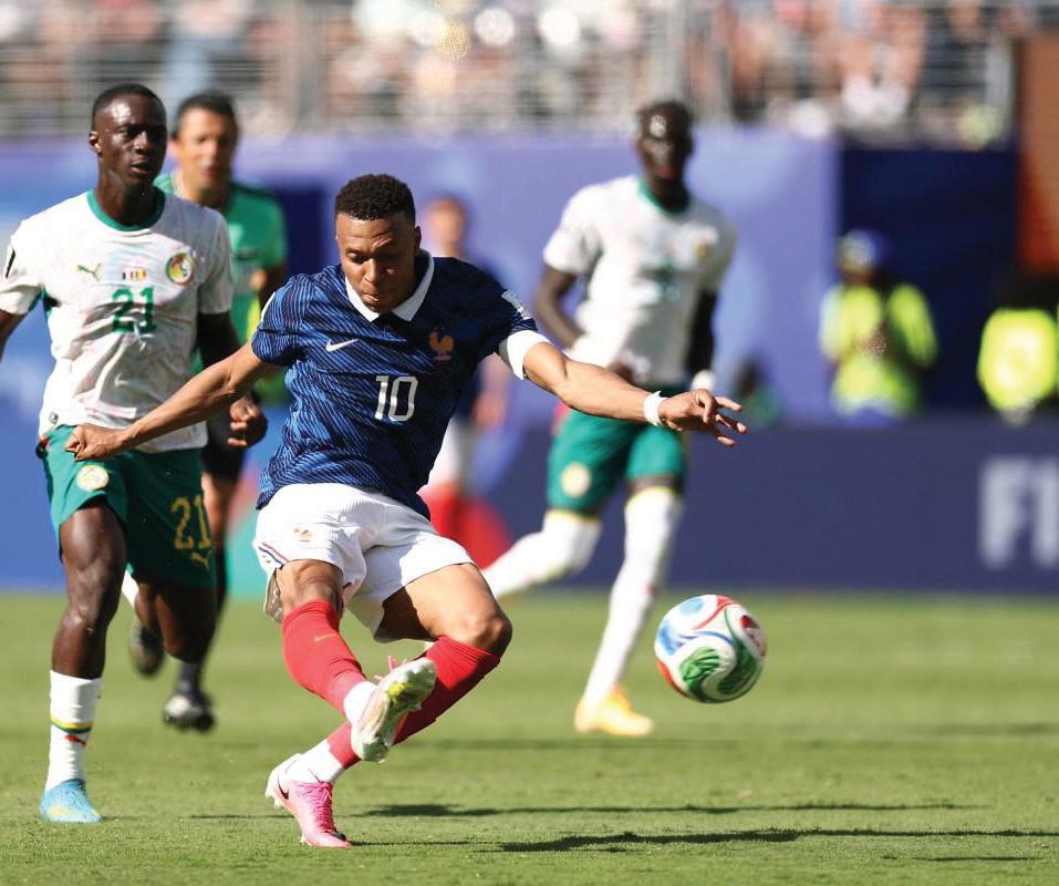 France boss in awe of his double hero