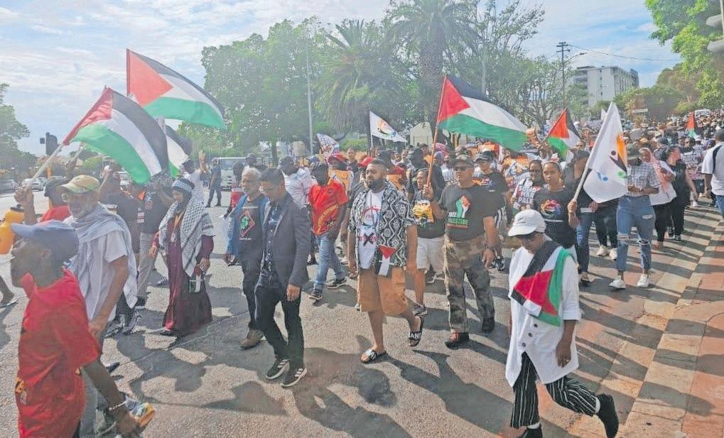 Civil society groups brave heat for solidarity march