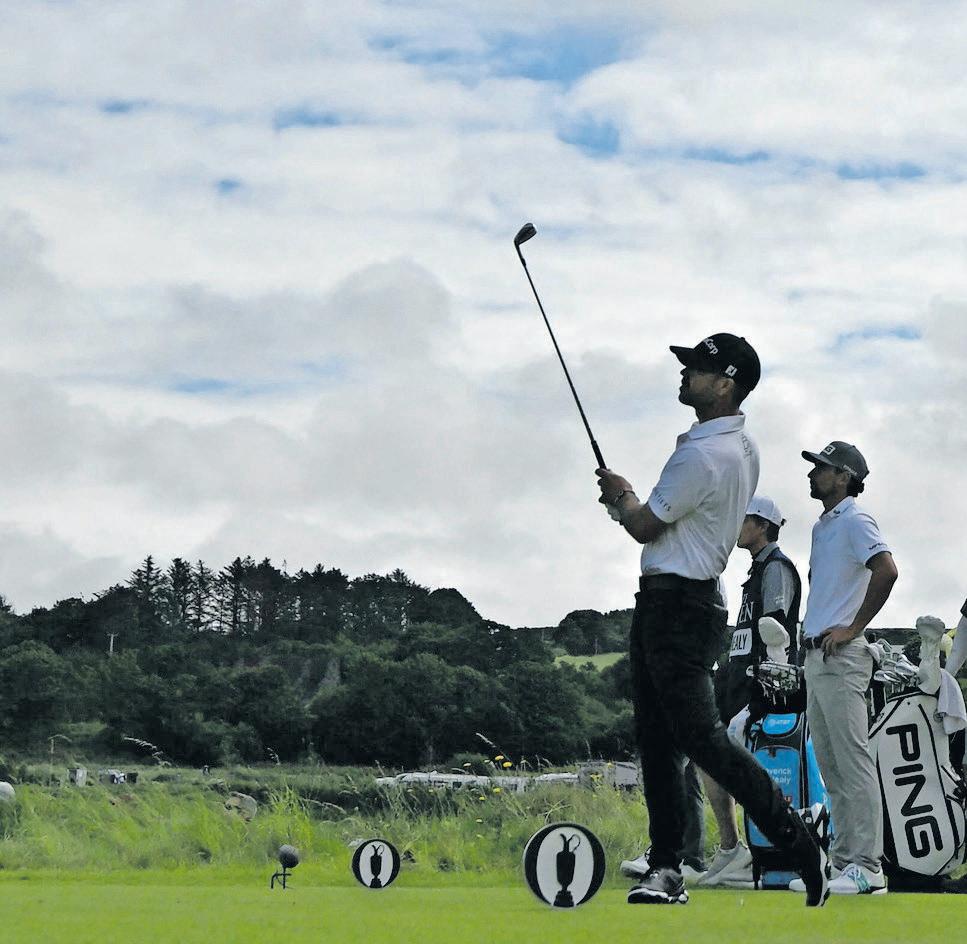 Charging Scheffler closes on British Open lead
