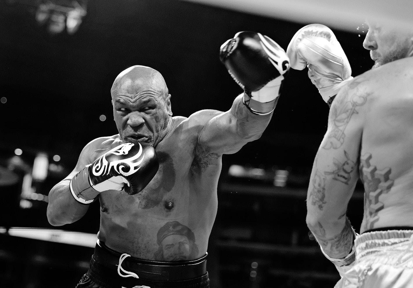 Boxing icons Tyson, Mayweather to meet in ring in 2026