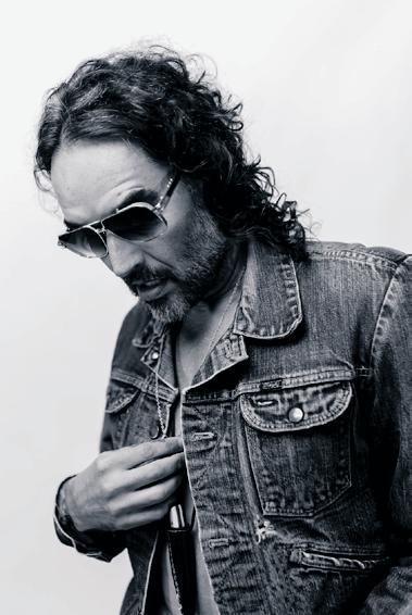Bible in hand, Russell Brand pleads not guilty to new sexual assault charges