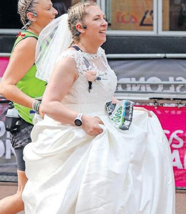 She finished race in wedding gown to honour her late husband