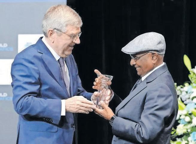 Ramsamy receives Order of Merit Award from World Aquatics