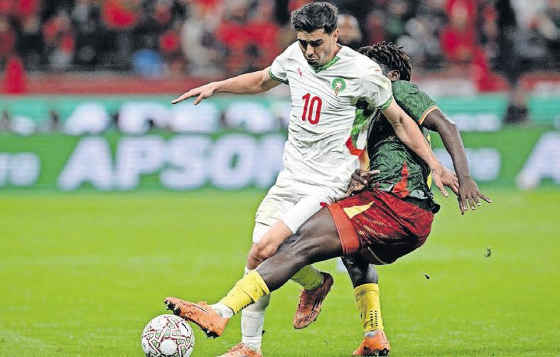 Regragui urges calm as hosts reach AFCON last four