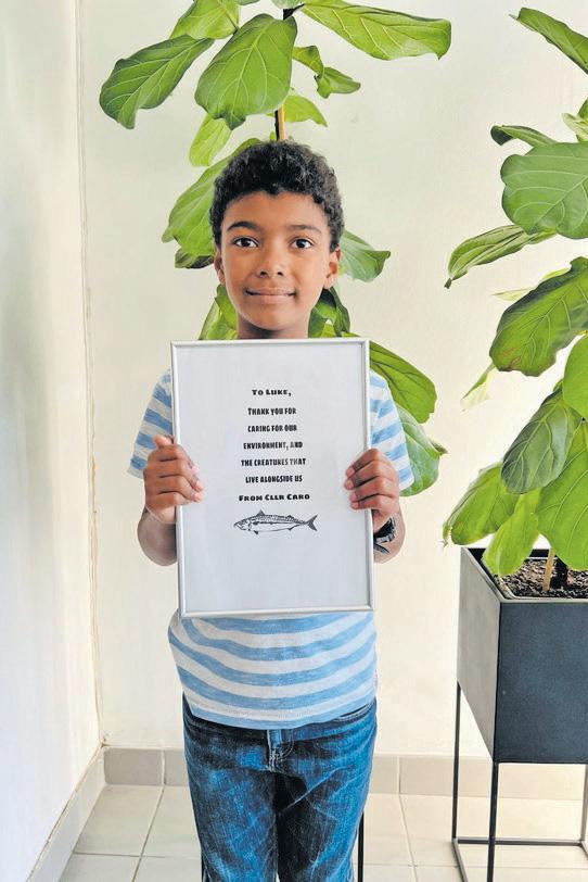 Young hero saves fish from illegal gill net