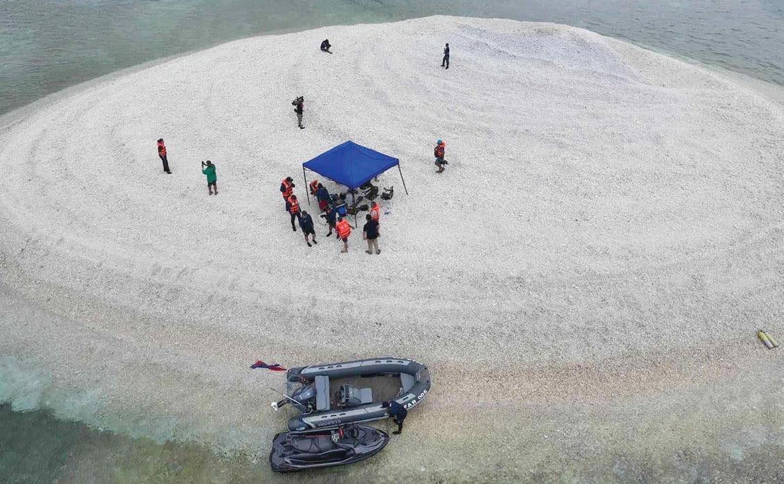 China and Philippines trade barbs over disputed reef