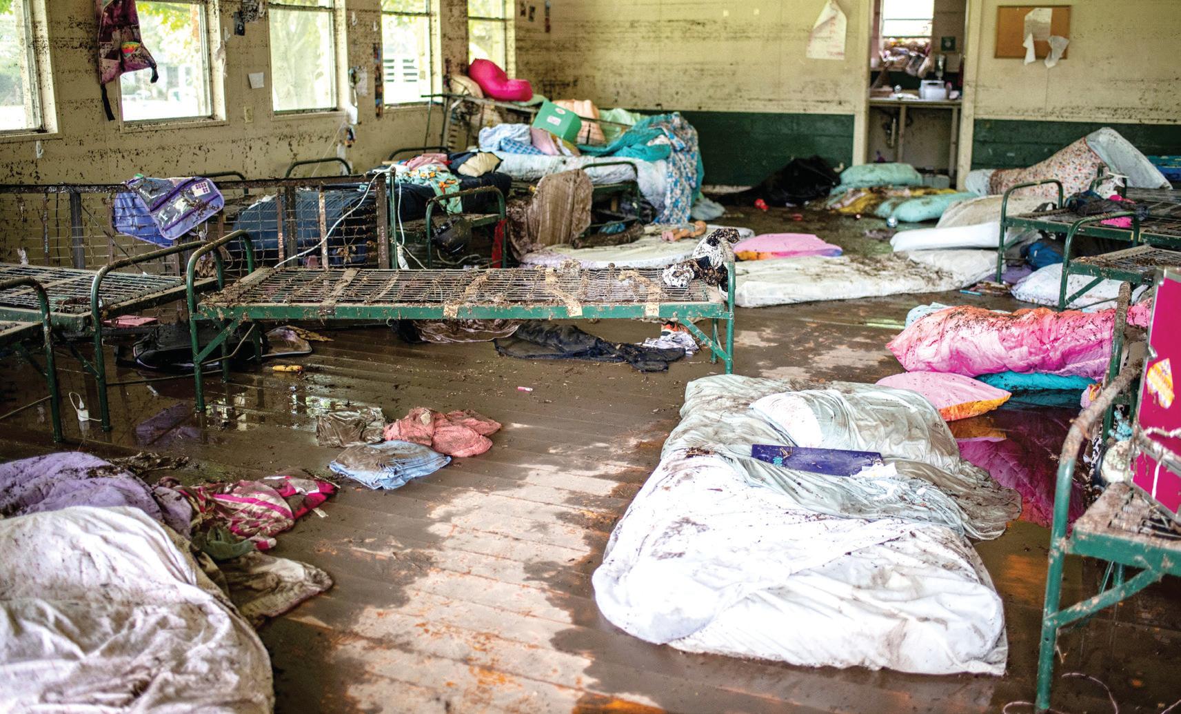 Witness recalls furniture, trees and RVs swept down