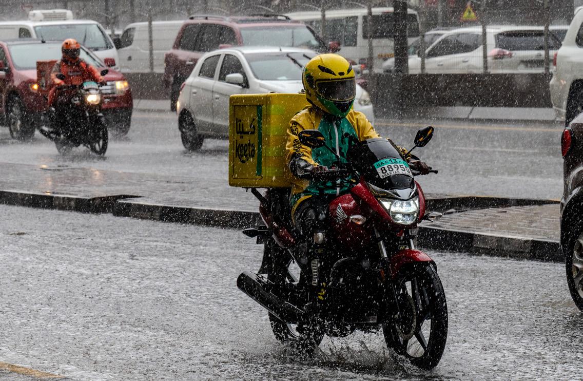 Delivery apps limit driving distance, pause services as riders deal with downpour