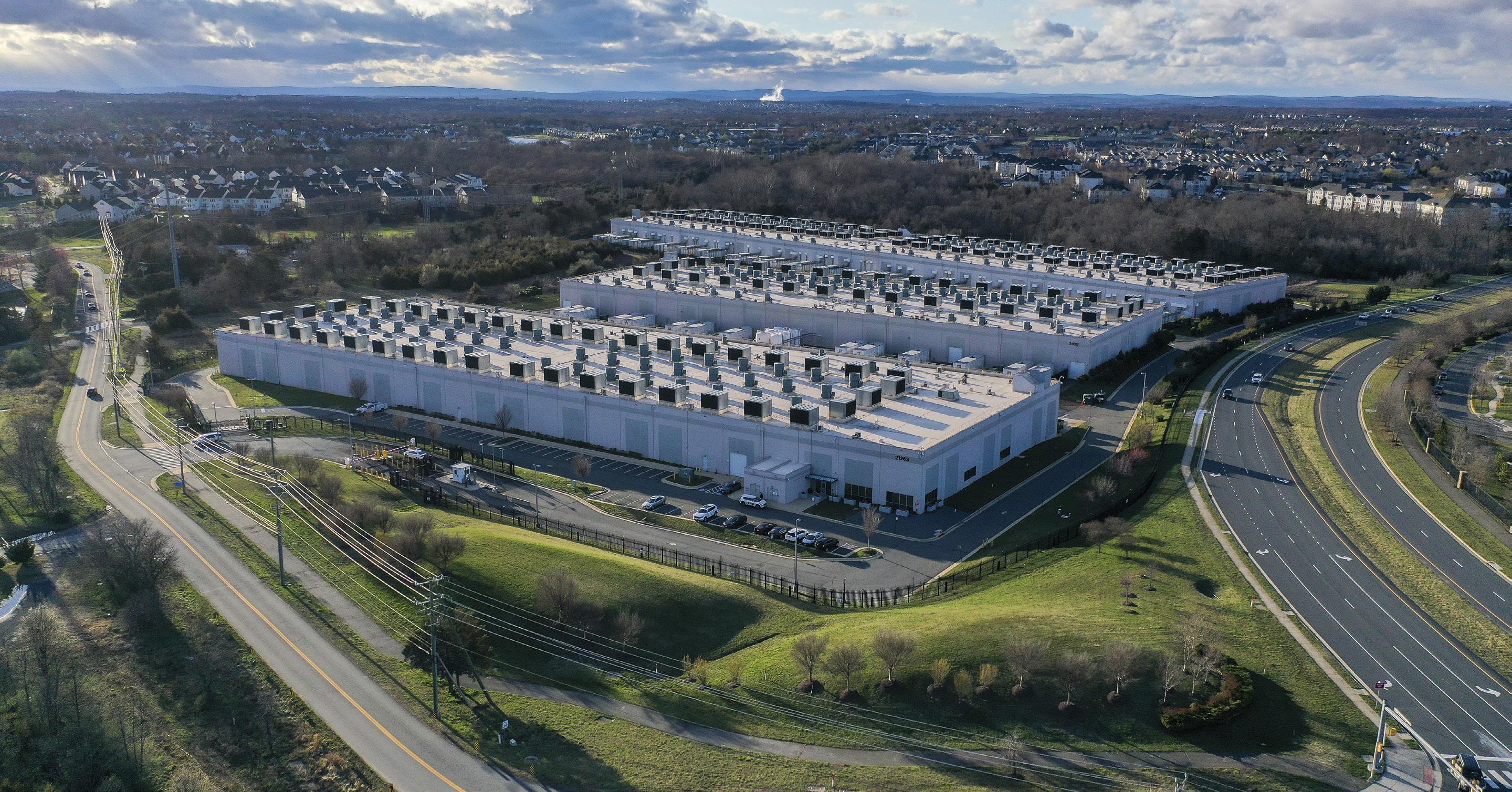 How Big Tech is offloading the risks of the AI boom