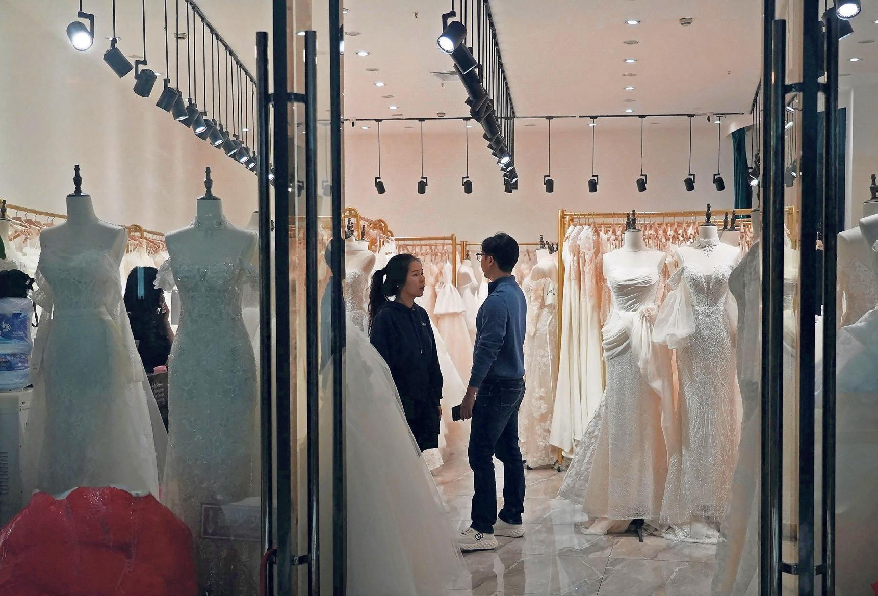 China's wedding dress sellers pin hopes on rise in marriages